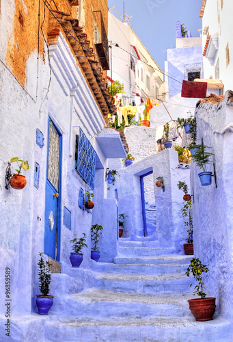 Street with stairs in medina of moroccan blue town Chaouen © Boris Stroujko