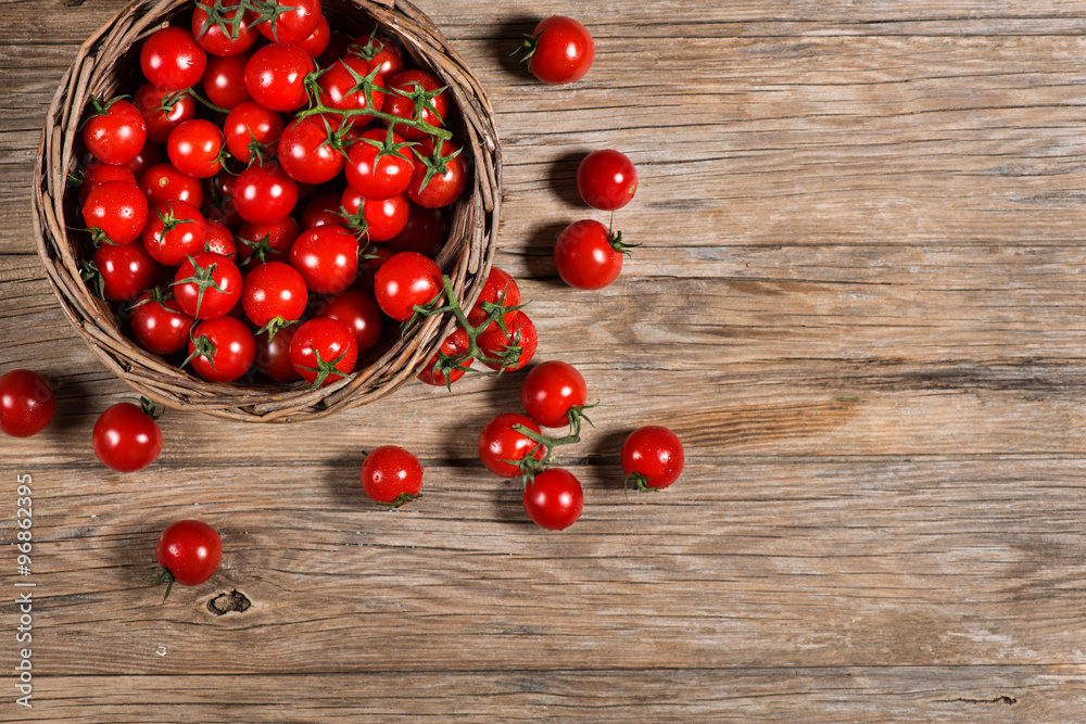 Tomatoes in a basket, view from above Tomatoes in a basket, view from above