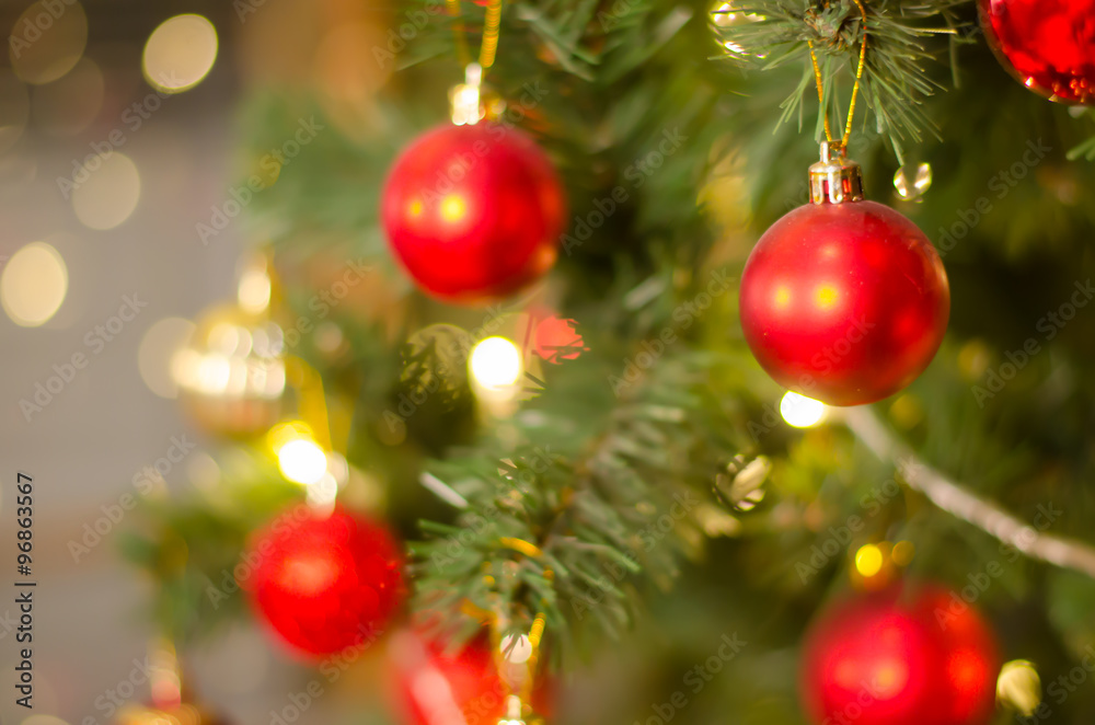 Fototapeta premium Christmas and New Year Decoration. Bauble on Christmas Tree. Abs