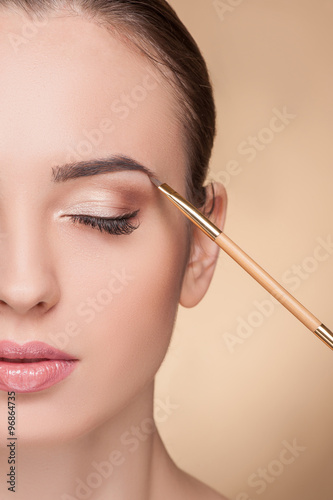 Obraz na plátně Pretty young model is attending beauty shop