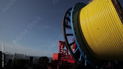 Laying of underwater optical cable on sea bottom
