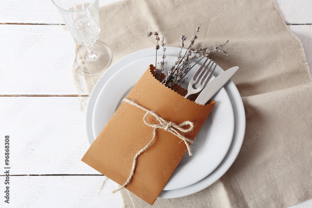 Obraz premium Table setting with lavender flowers, close-up