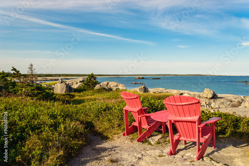Red chairs facing Keji Seaside beach © Petrov Vadim