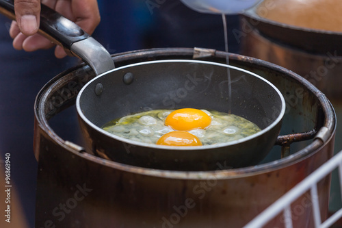 Fried  scrambled eggs in fat.