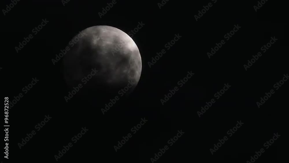 Mysterious clouds pass over full moon night. Mysterious clouds pass over full moon night.