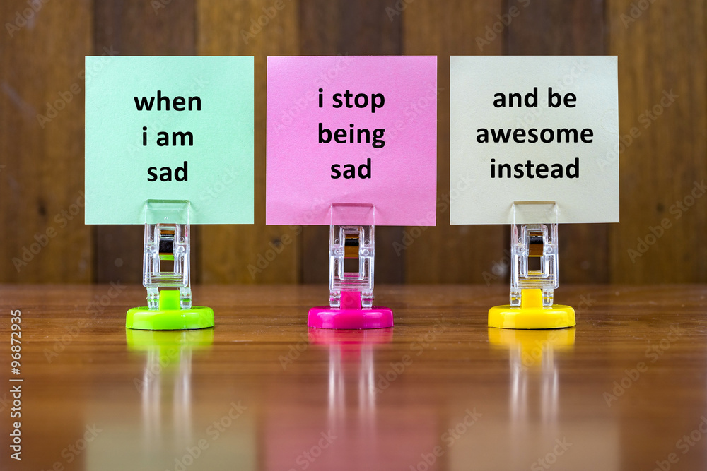 Word quotes of WHEN I AM SAD I STOP BEING SAD AND BE AWESOME INSTEAD on  colorful sticky papers against wooden textured background. Stock Photo |  Adobe Stock