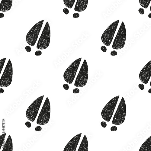 Seamless pattern with doodle cow tracks. Animal footprint background.