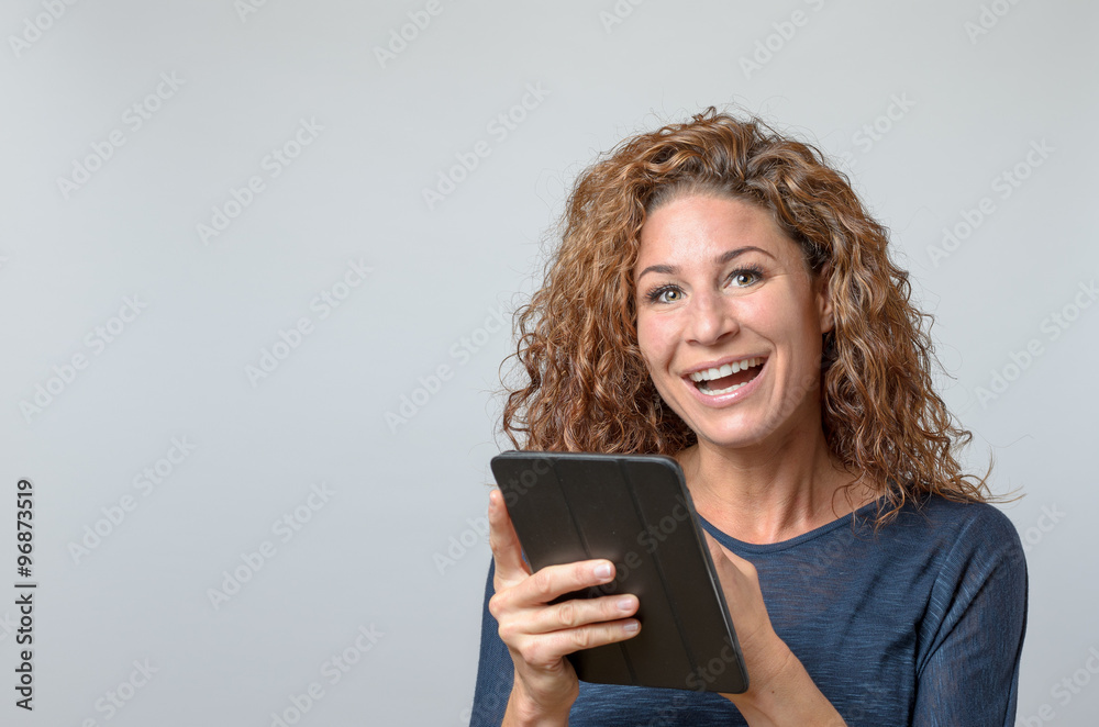 Fototapeta premium Woman Holding a tablet