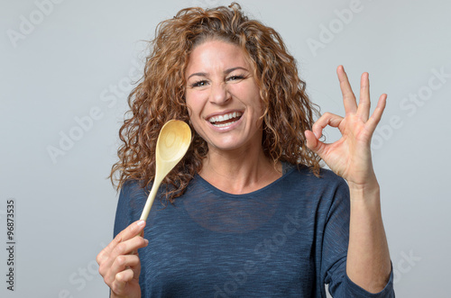 woman with a wooden spon photo