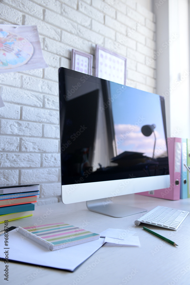 Fototapeta premium Modern workplace with computer on the table, close up
