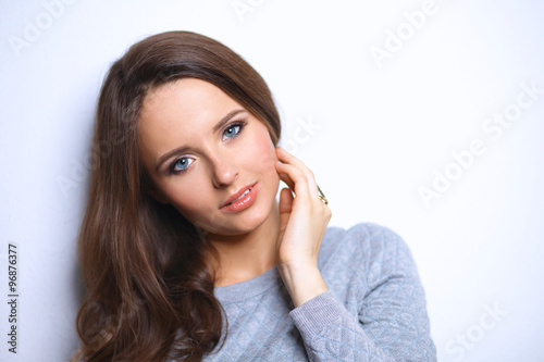 Portrait of an attractive fashionable young brunette woman