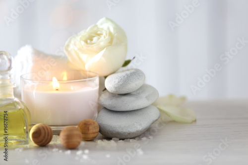 Beautiful composition of spa treatment on wooden table