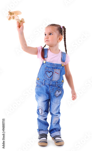 Beautiful little girl plays...