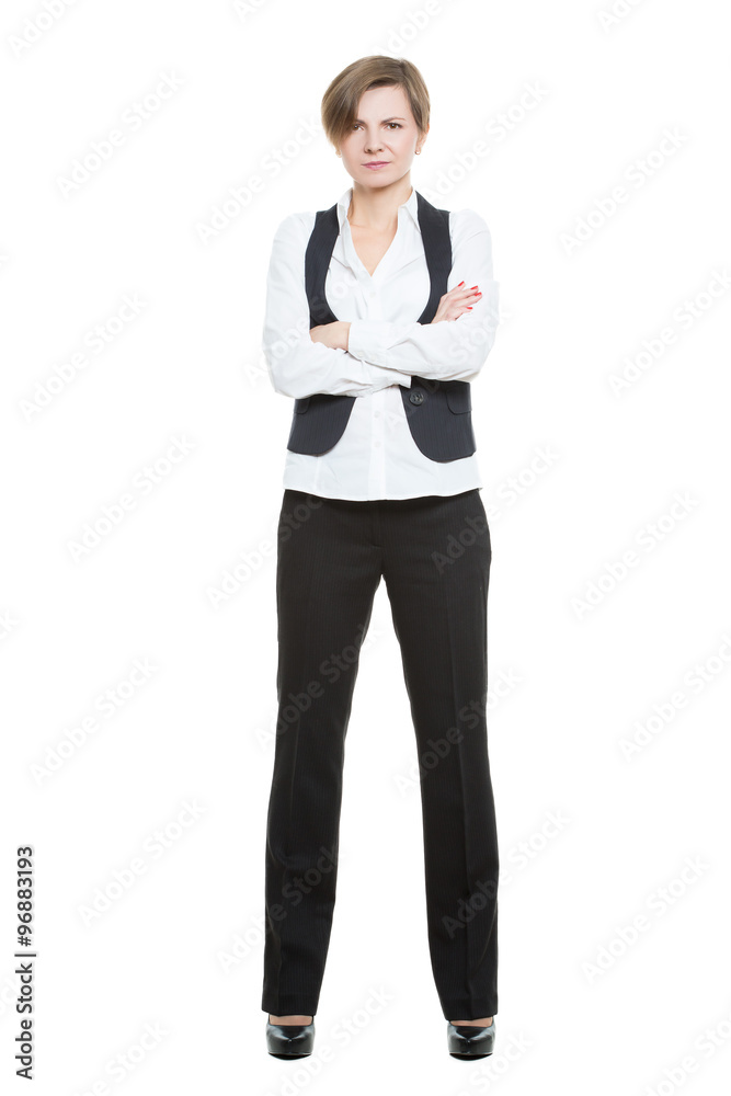 Portrait in full growth. Businesswoman legs wide apart. isolated white background. closed pose, arms crossed Portrait in full growth. Businesswoman legs wide apart. isolated white background. closed pose, arms crossed