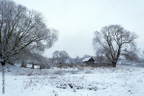 Winter landscape. The first snow in the village