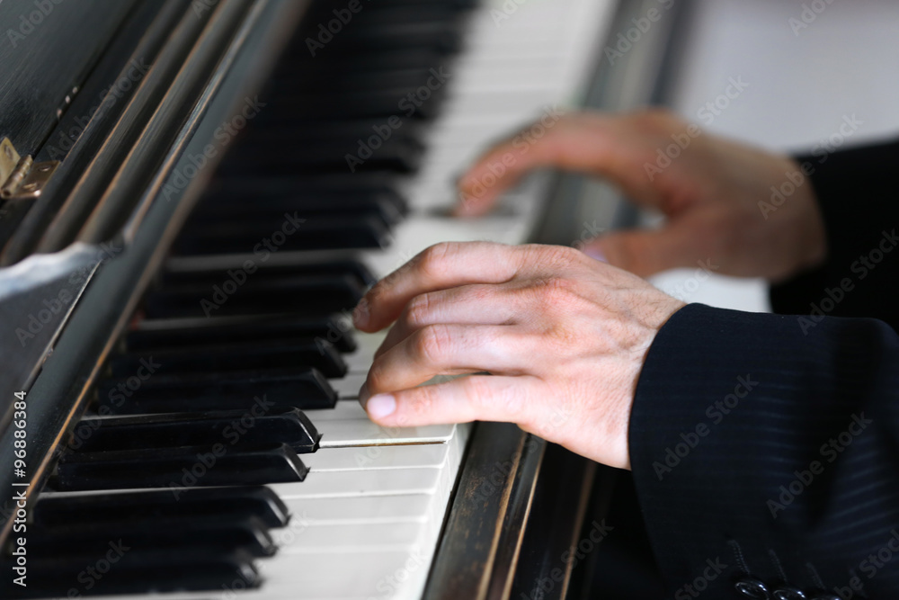 Close up of man hands piano playing Close up of man hands piano playing