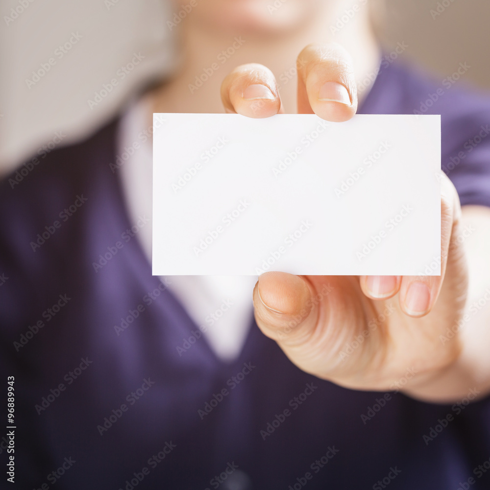 female teen girl hold business paper card closeup female teen girl hold business paper card closeup