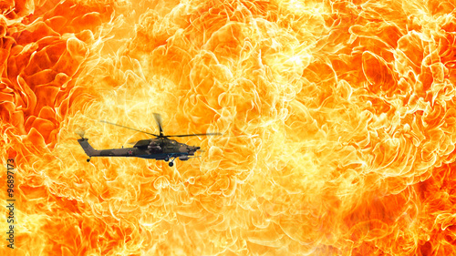 Combat helicopter on a fiery background, Fire flames photo