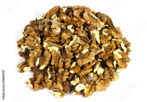 Bunch of shelled walnuts on white