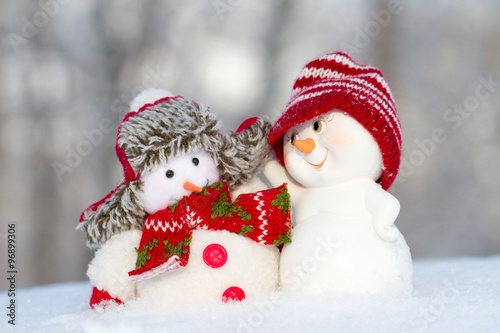 two small cheerful snowman © dadoodas