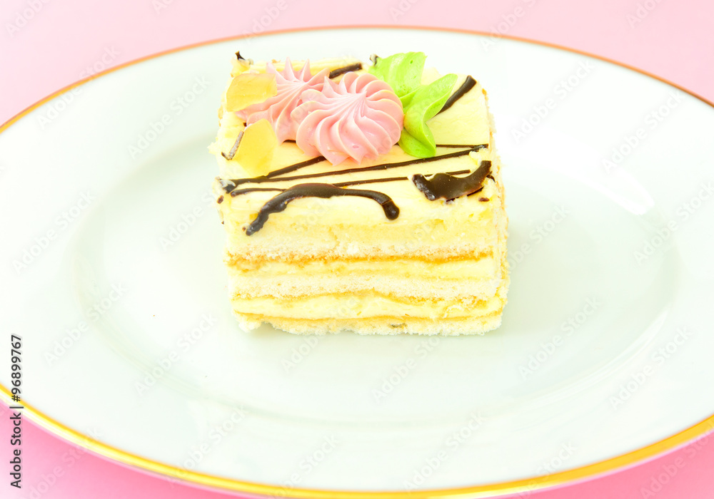Sweets: Cream Cakes on Plate. Sweets: Cream Cakes on Plate.