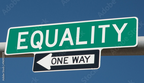 Equality on green overhead highway sign with one way arrow  © Rex Wholster
