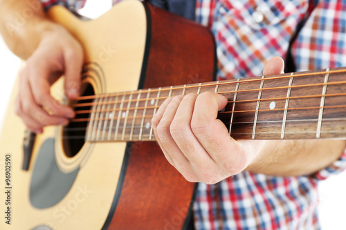 Young musician with guitar, close-up