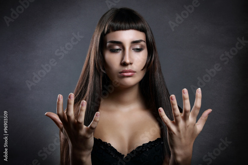 Beautiful woman looking at her hands