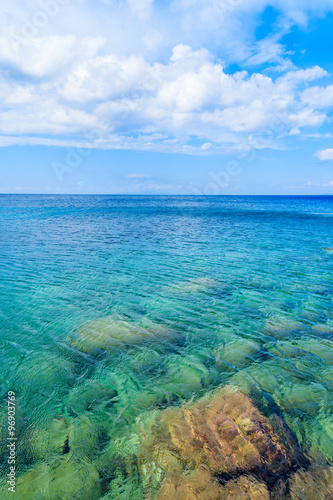 Crystal clear sea water of Aegean Sea at Kokkari beach  Samos island  Greece