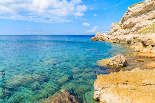 Crystal clear sea water of Aegean Sea at Kokkari beach, Samos island, Greece