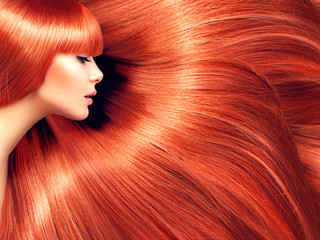 Beautiful hair. Beauty woman with long red hair as background