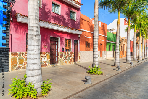 Colourful houses and palm trees on street in Puerto de la Cruz town, Tenerife, Canary Islands, Spain © pkazmierczak