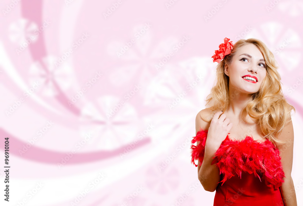 Pretty girl in red dress on blurred digital pink background