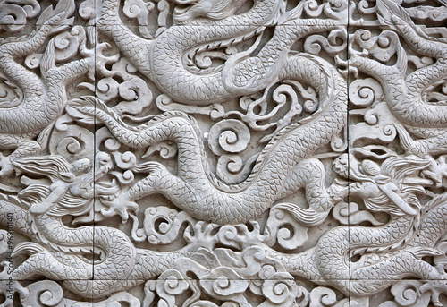 Close up of a Chinese dragon carved in stone - shallow dof