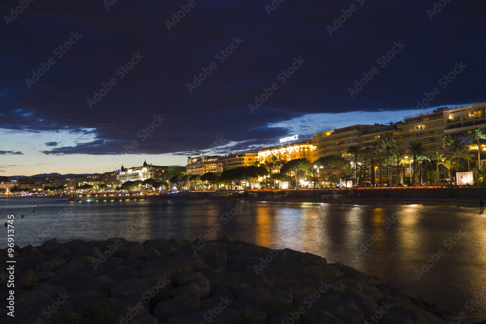 The beach promenade of Cannes at night