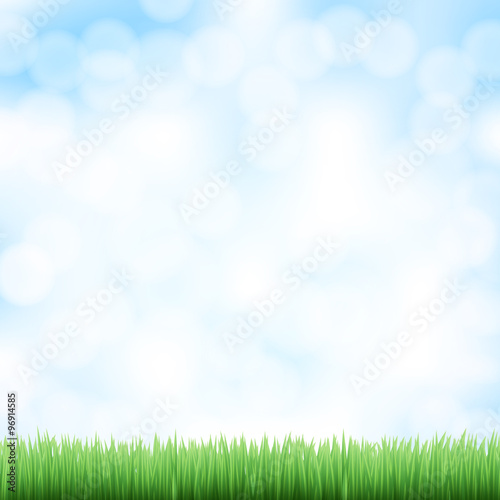 spring sky background with green grass