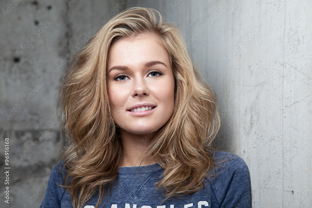 Portrait of a blonde girl with bushy hair Portrait of a blonde girl with bushy hair