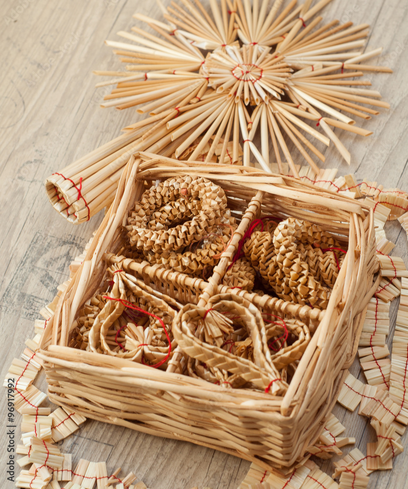 czech staw christmas decirations on vintage wooden table