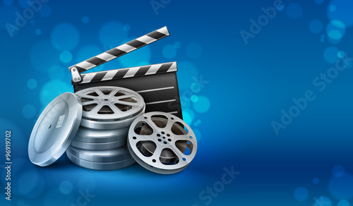Movie film disks with directors clapper for cinematography.