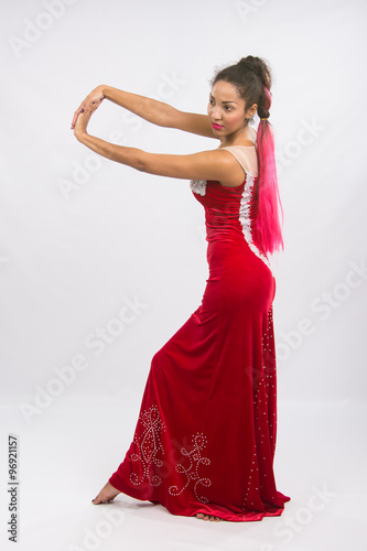 Girl dancer performs a dance elements