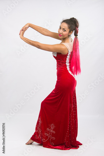 Girl dancer performs a dance elements