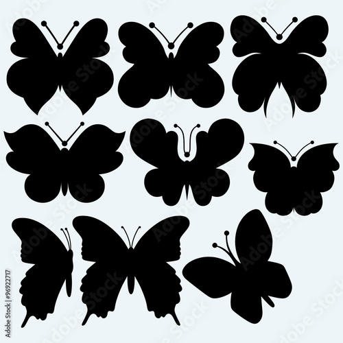 Set icon butterfly. Isolated on blue background. Vector silhouettes © Kreatiw