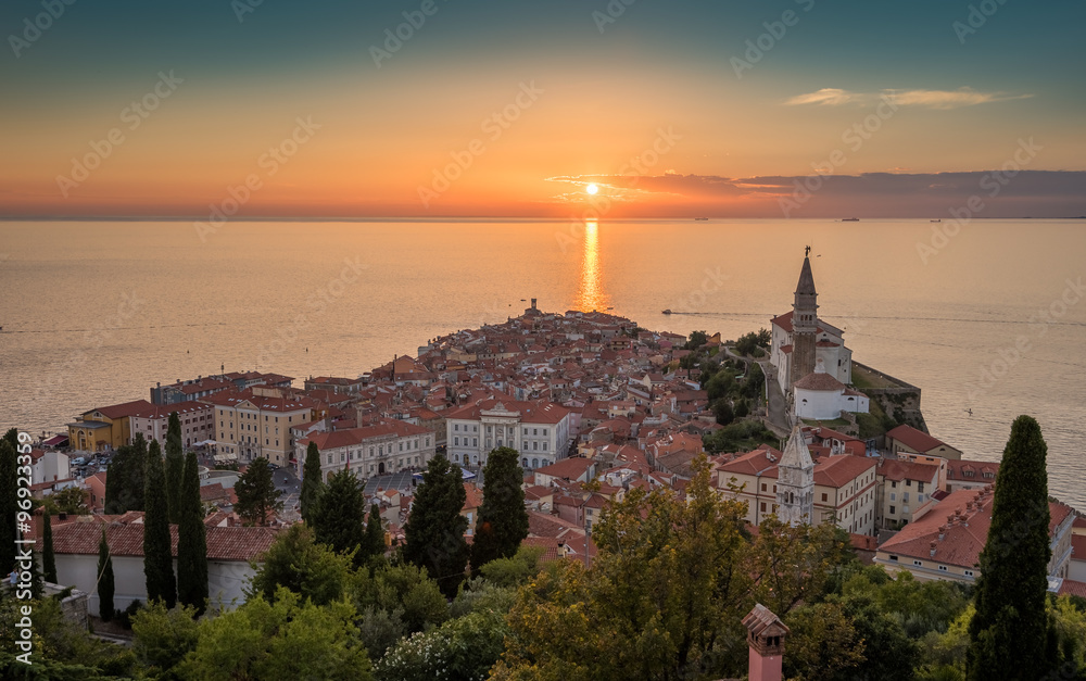 Sunset Over Adriatic Sea and Picturesque Old Town of Piran, Slovenia. Aerial View.