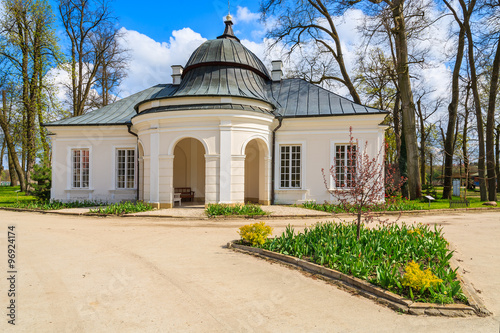 Historic orangery building in Kurozweki palace park, Poland