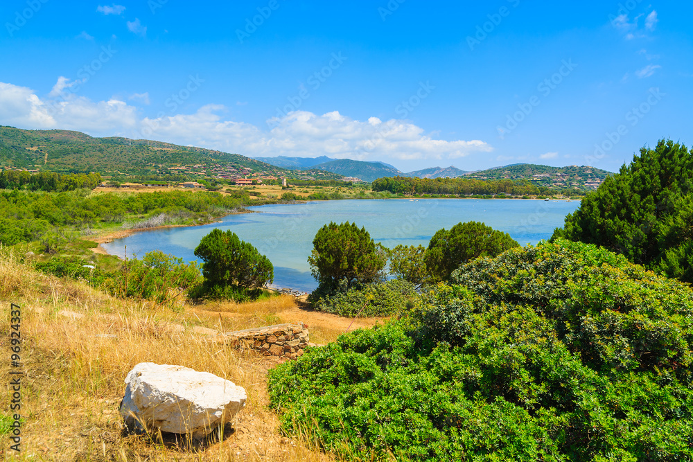 Countryside landscape of Sardinia island near Chia beach on sunny summer day, Italy