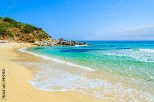 Crystal clear water of Cala Sinzias beach, Sardinia island, Italy