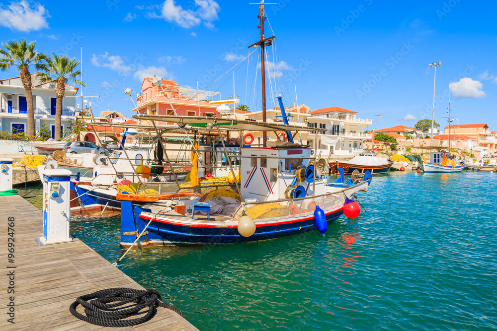 Colorful traditional Greek fishing boats in port of Lixouri town, Kefalonia island, Greece