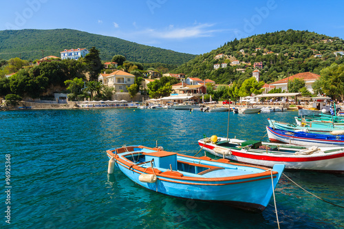 Colorful Greek fishing boats in port of Kioni on Ithaka island, Greece