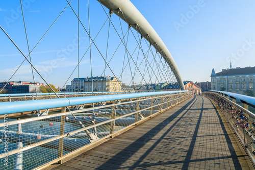 Bernatka bridge over Vistula river on sunny autumn day in city of Krakow, Poland © pkazmierczak