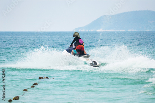Man on Jet Ski, Tropical Ocean, Vacation Concept